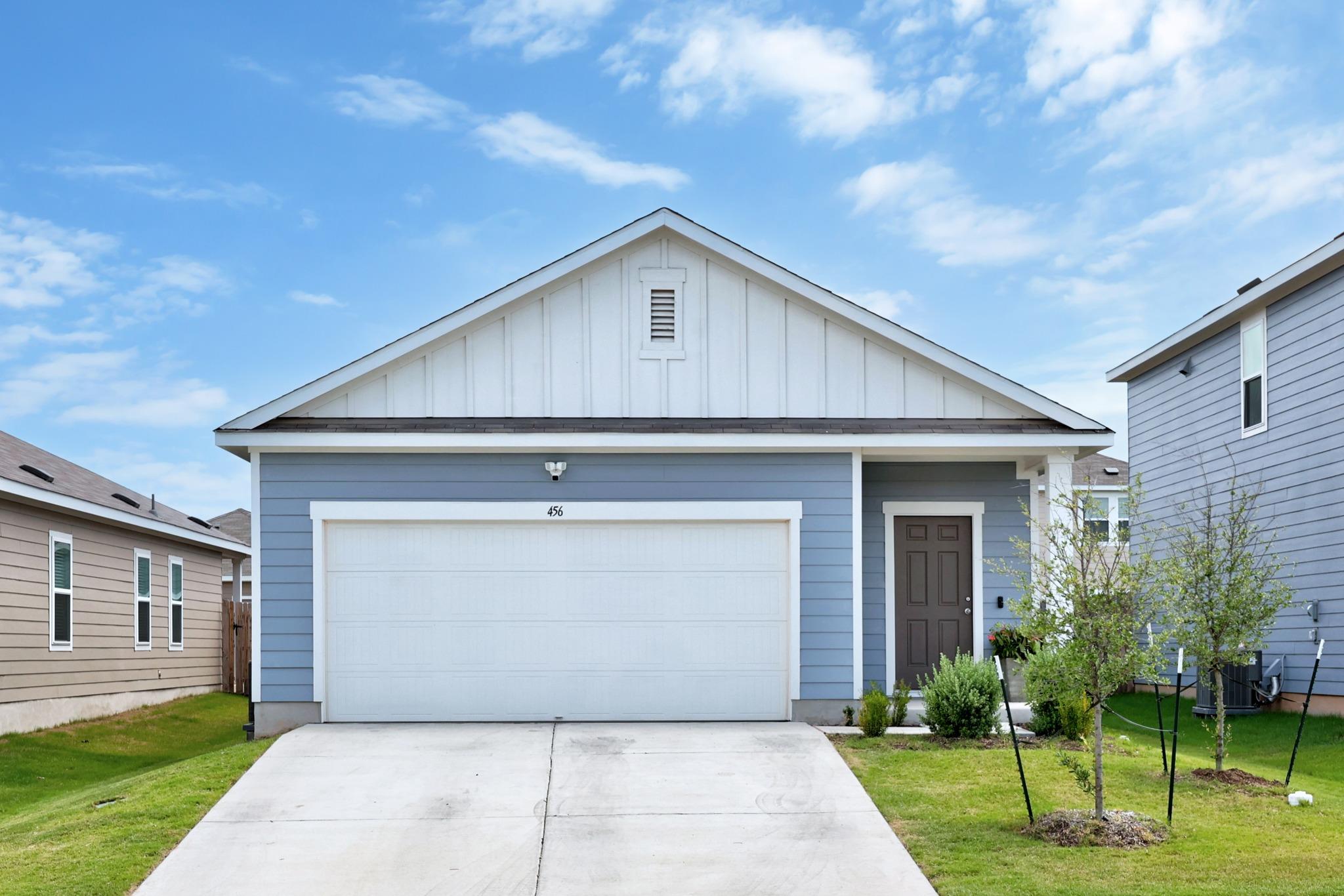 Single-story residence featuring light blue horiz