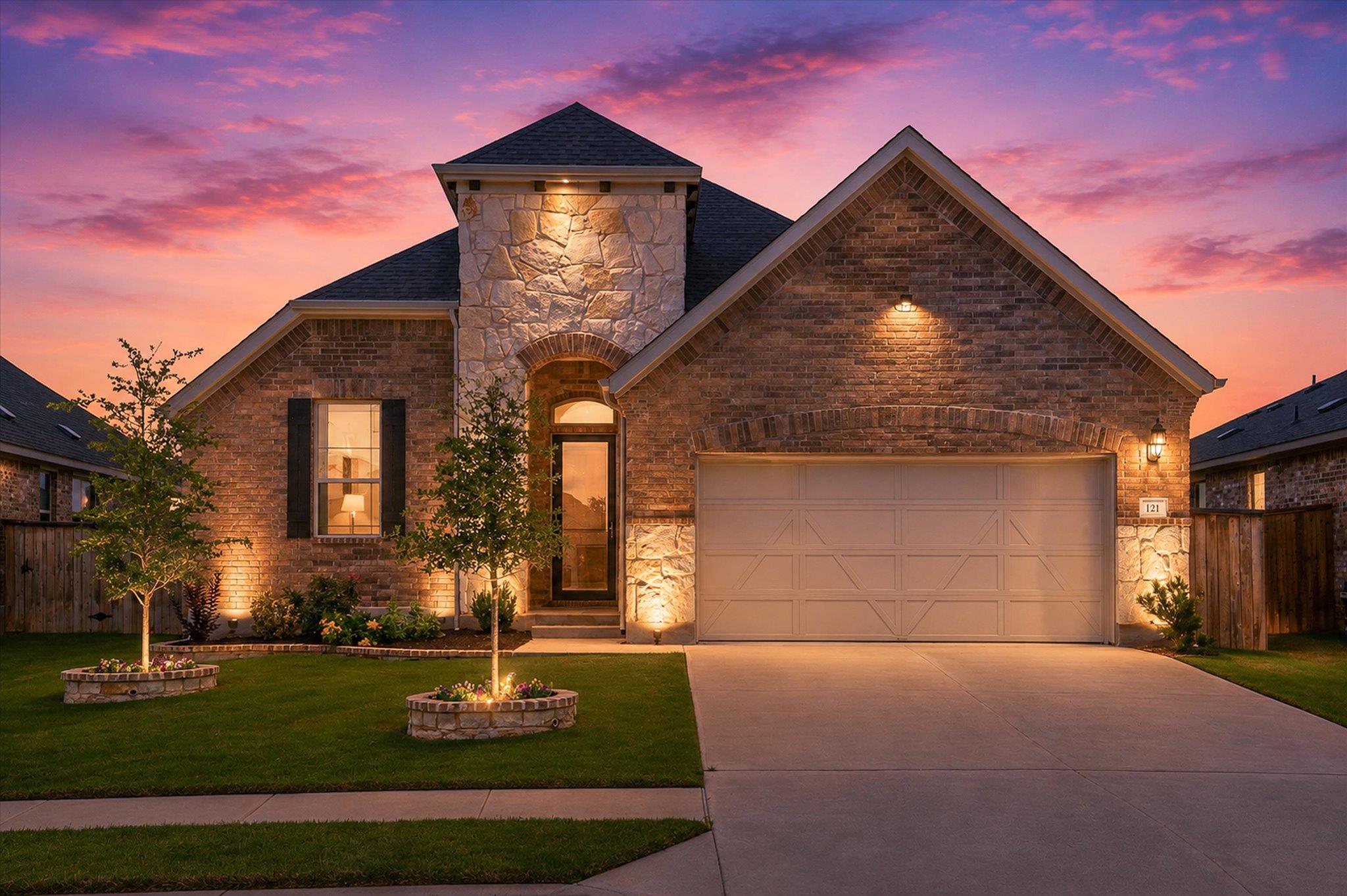 Brick and stone facade featuring a prominent arch