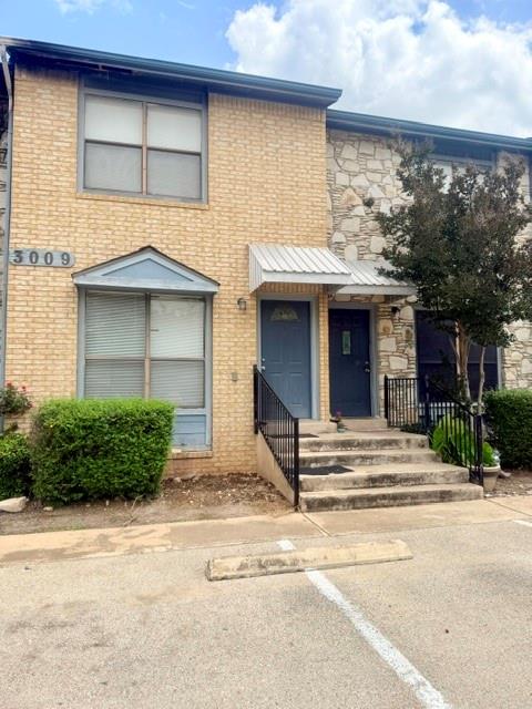 Listing photo 1 of 3009  Whisper Oaks Ln  #F