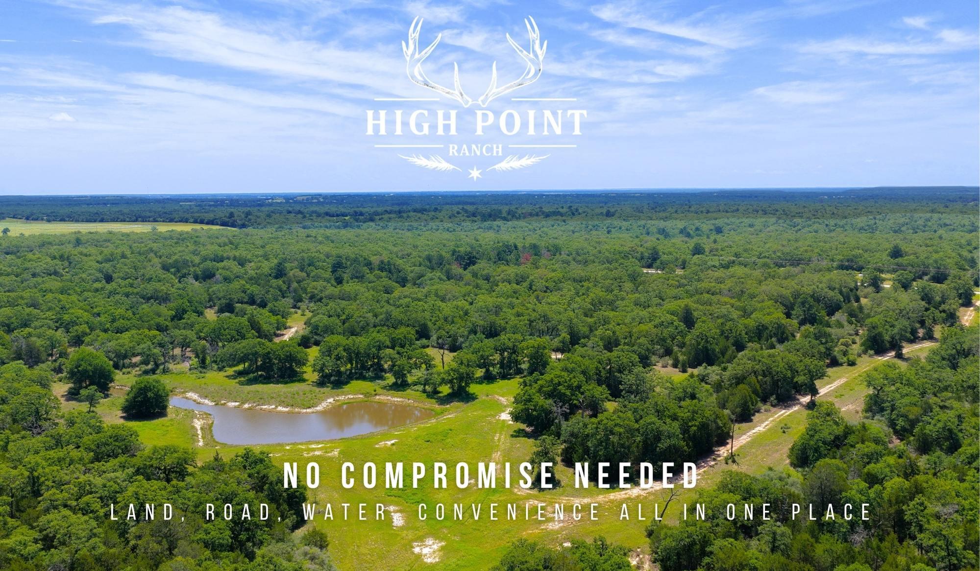 Expansive land parcel featuring dense tree cover,