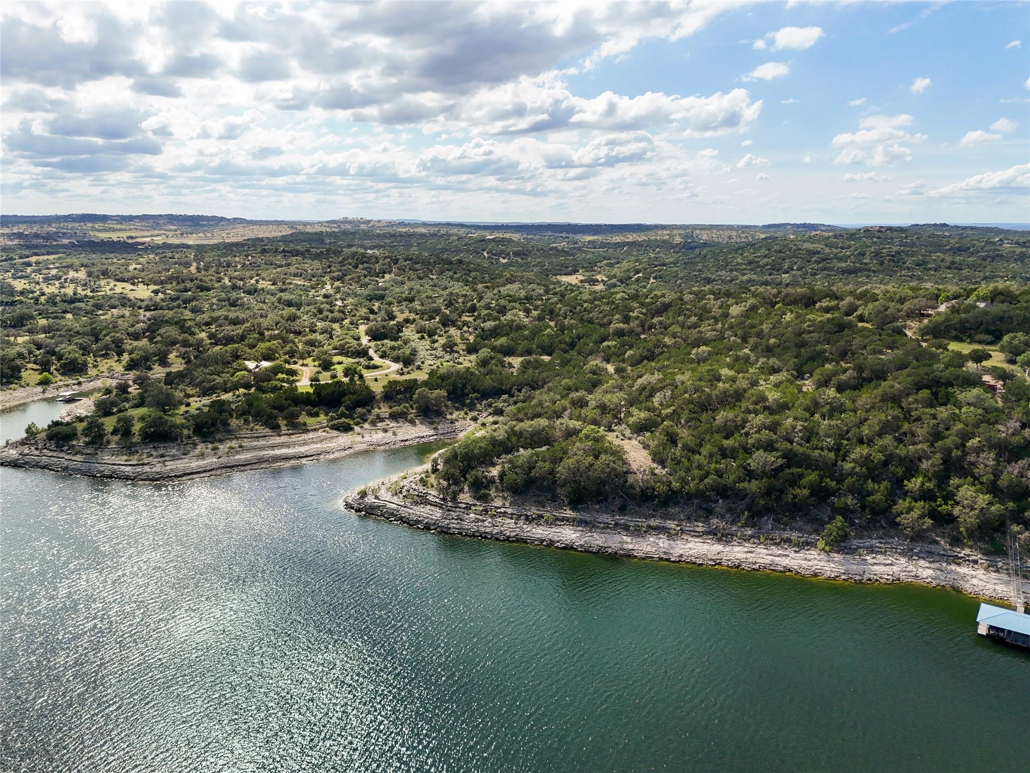 Expansive waterfront property featuring natural t