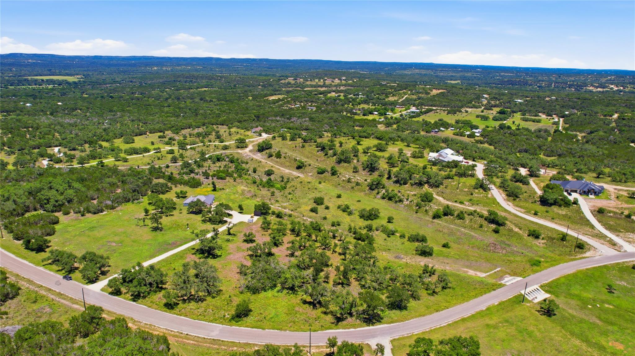 Rolling hills and ample acreage define this spraw