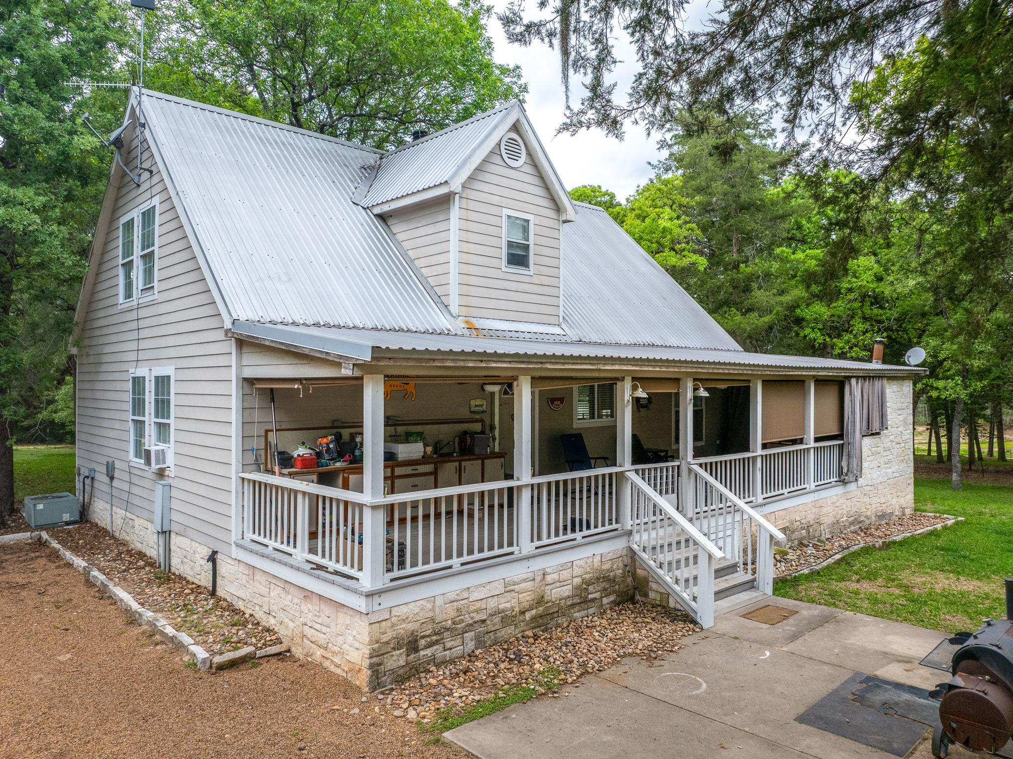 A charming country cottage featuring a spacious c