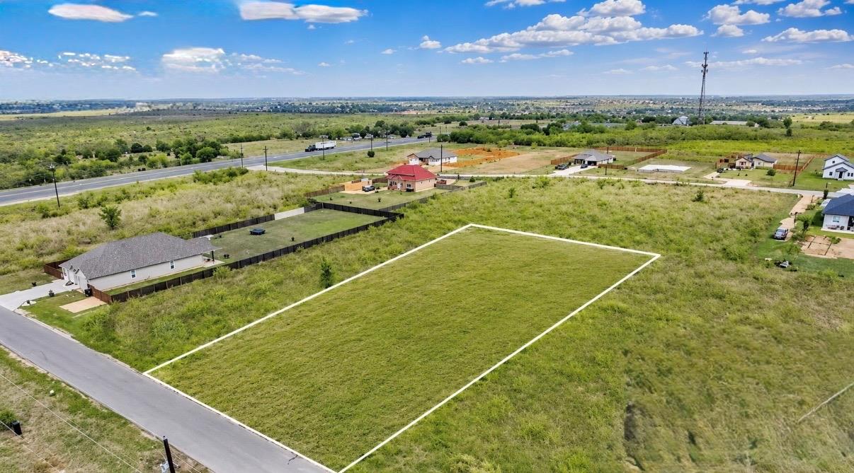 Ready to build, this prime lot offers ample space