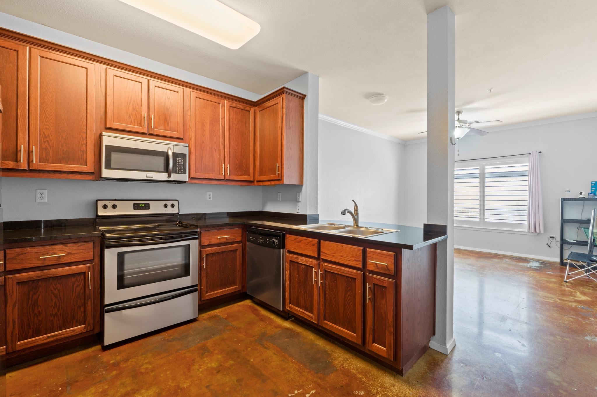 A well-appointed kitchen features rich wood cabin