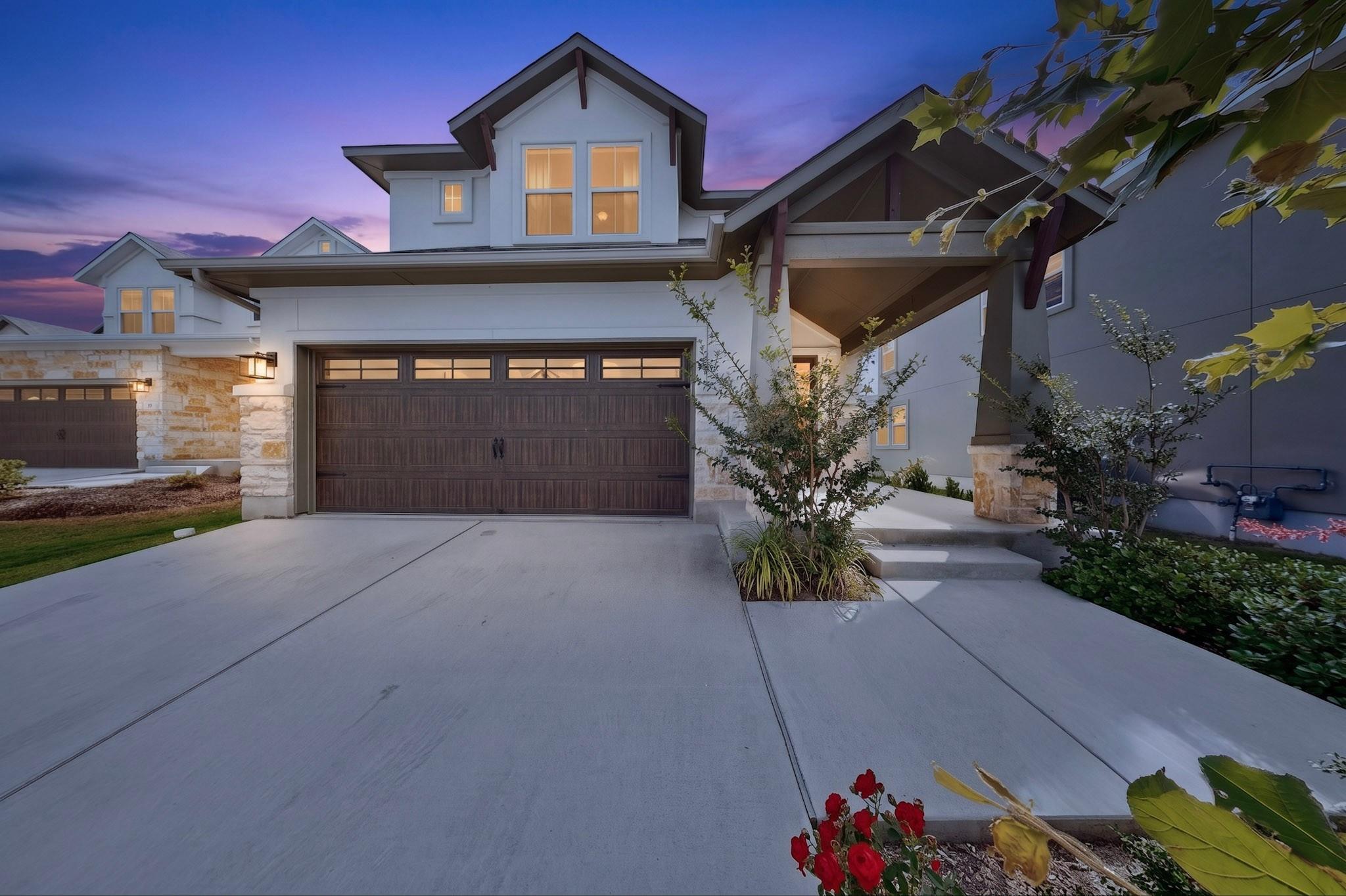 A striking modern facade with warm evening lights