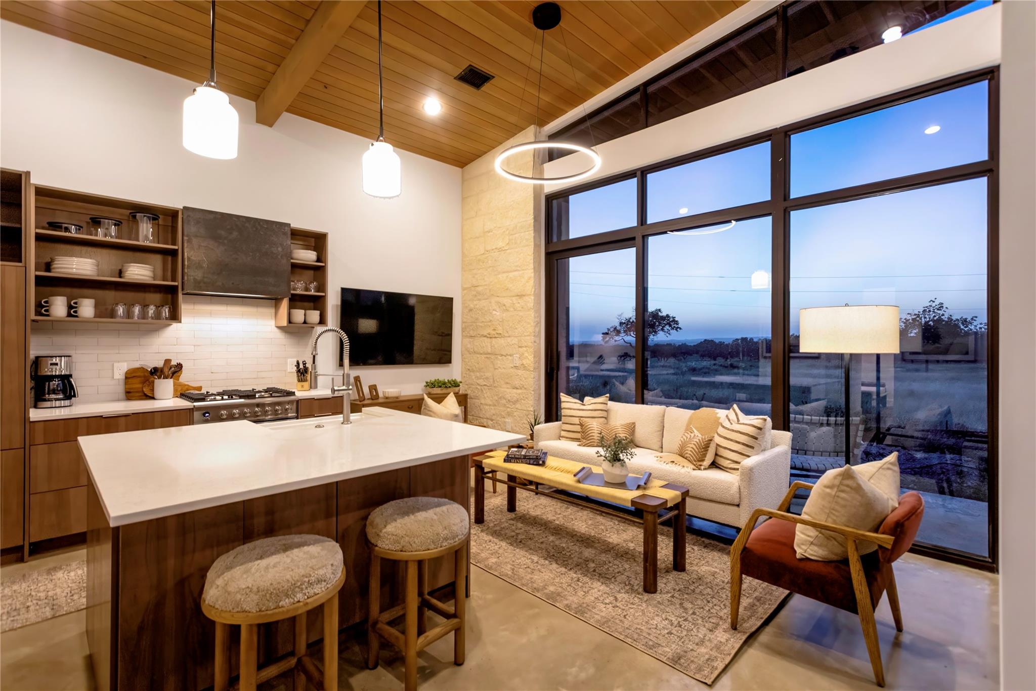 A striking open-concept kitchen and living area w