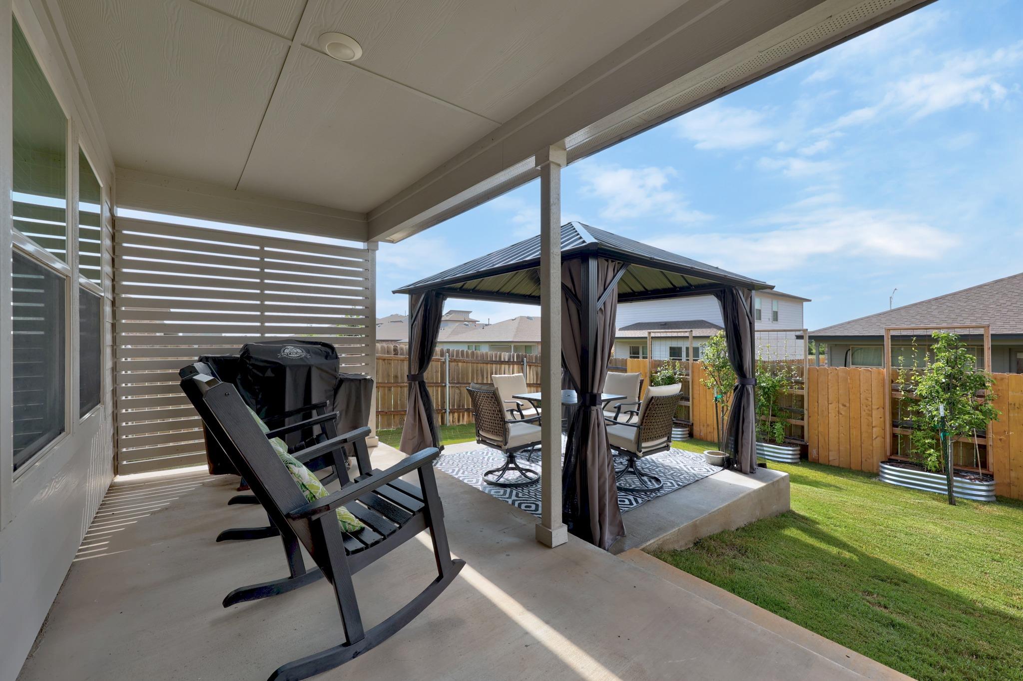 An inviting covered patio offers a private outdoo