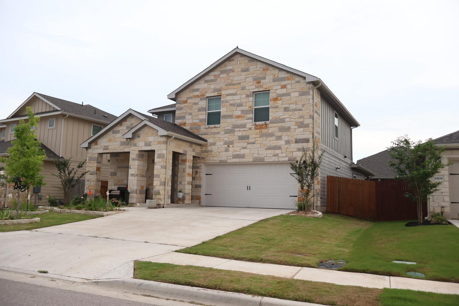 A traditional stone facade adorns this charming t
