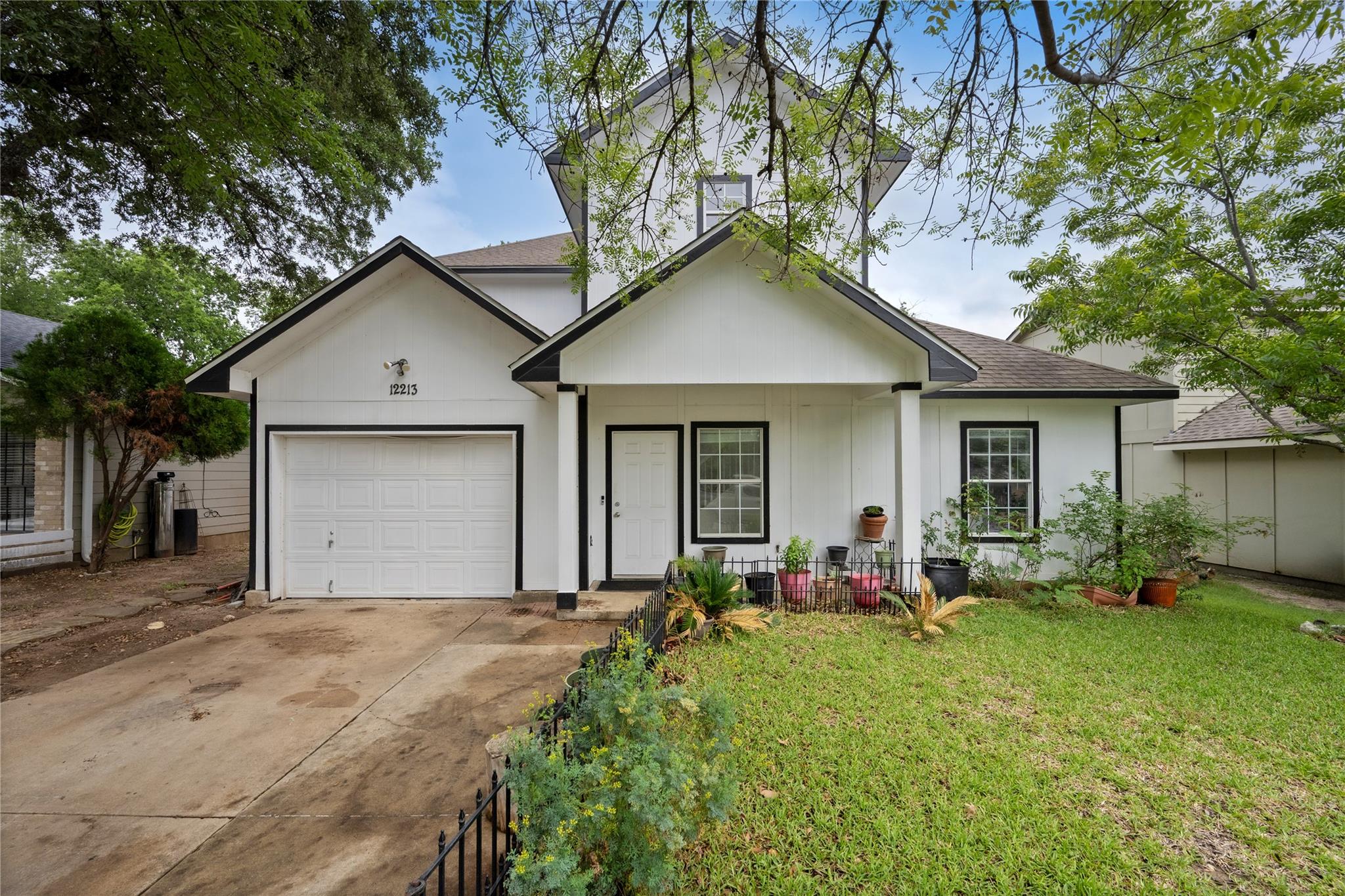 A classic white facade with contrasting trim and 