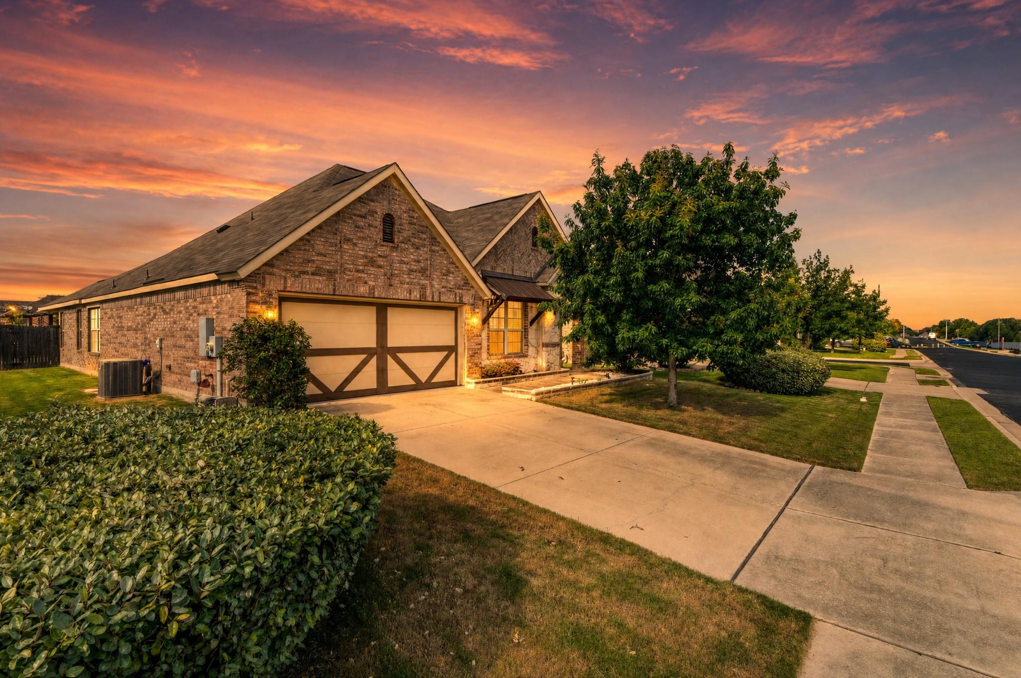 A striking brick and stone home with a decorative