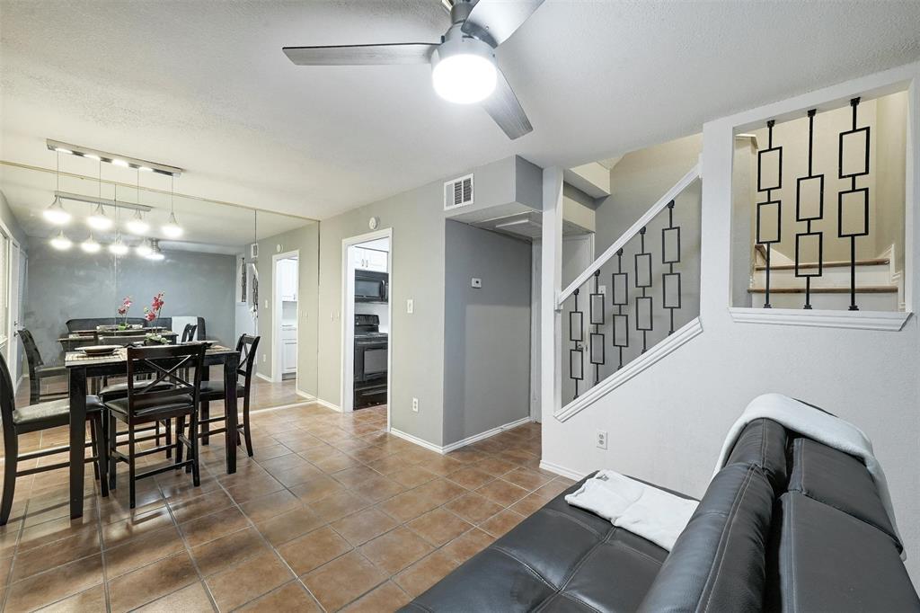 Discover a cohesive living and dining space with 