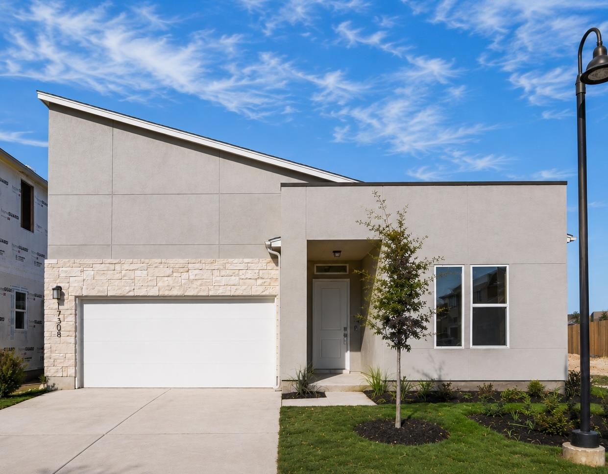 Modern facade with sleek lines, presenting a stri
