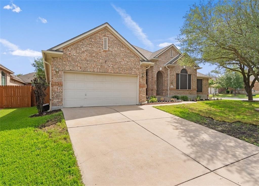 A classic brick exterior graces this welcoming ho