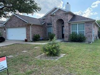 Brick veneer and well-maintained landscaping offe