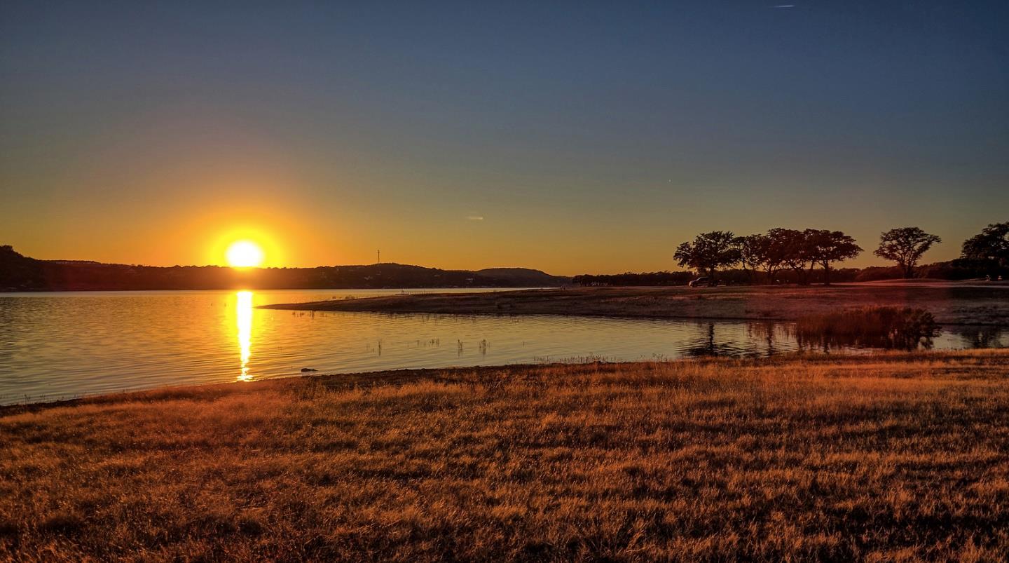 Witness golden hour from this expansive lakeside 