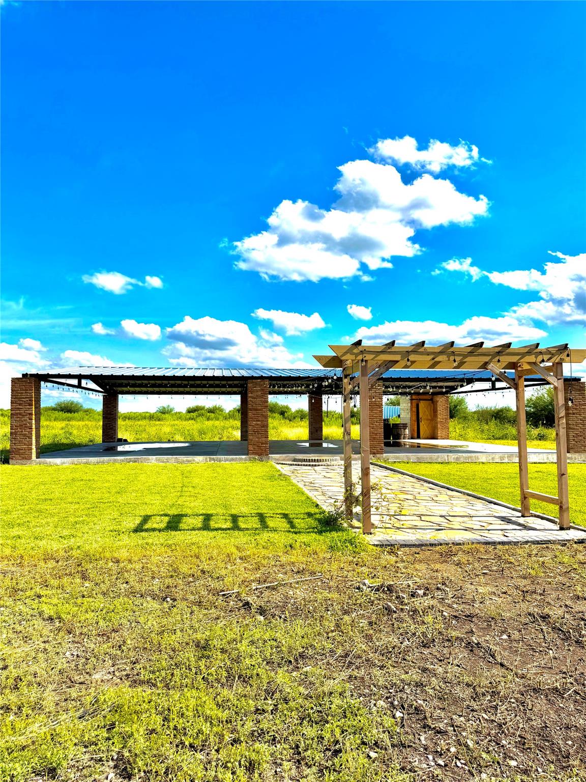An inviting open-air pavilion and pergola, perfec