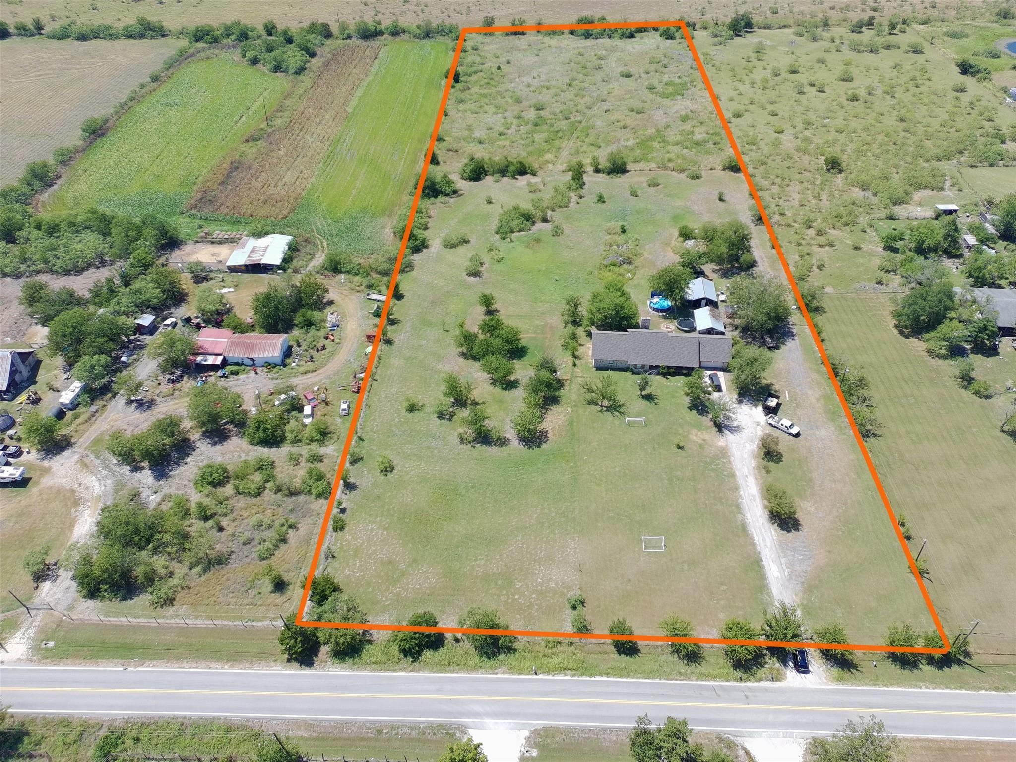 An aerial perspective reveals a vast land parcel 