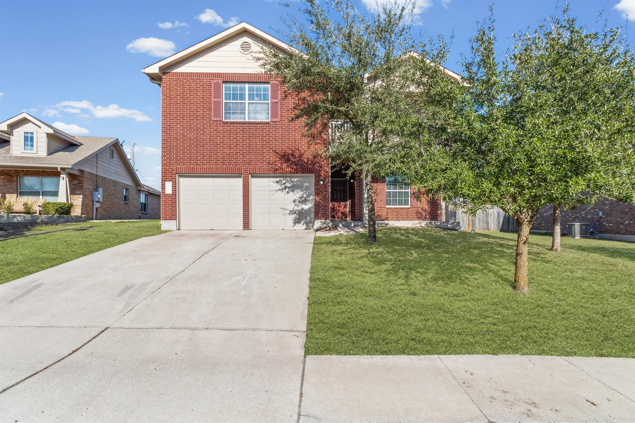 A classic brick exterior offers enduring curb app