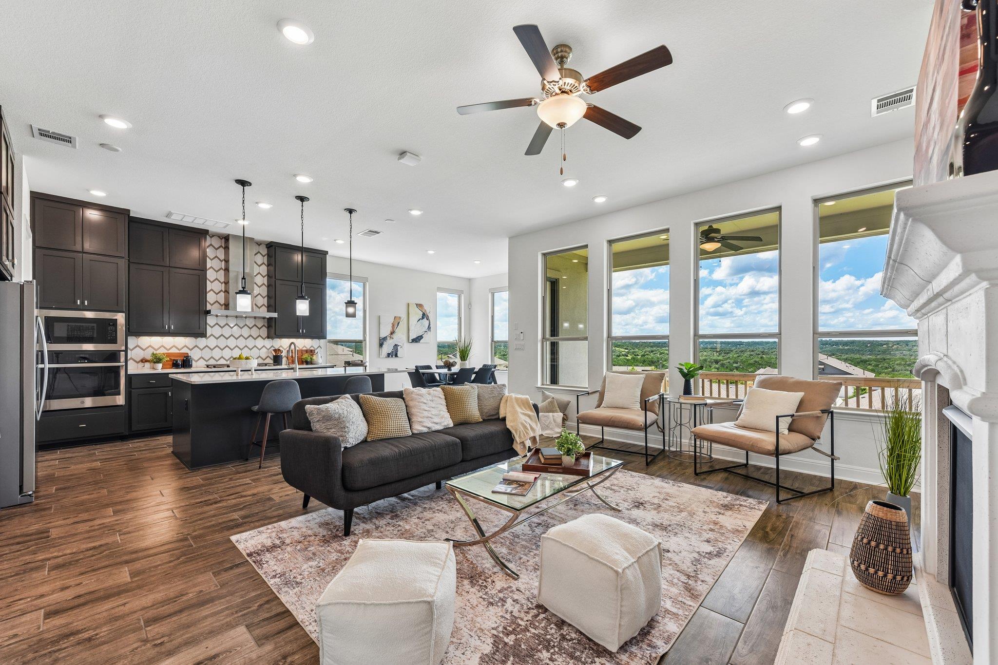An open concept living area boasts a modern kitch