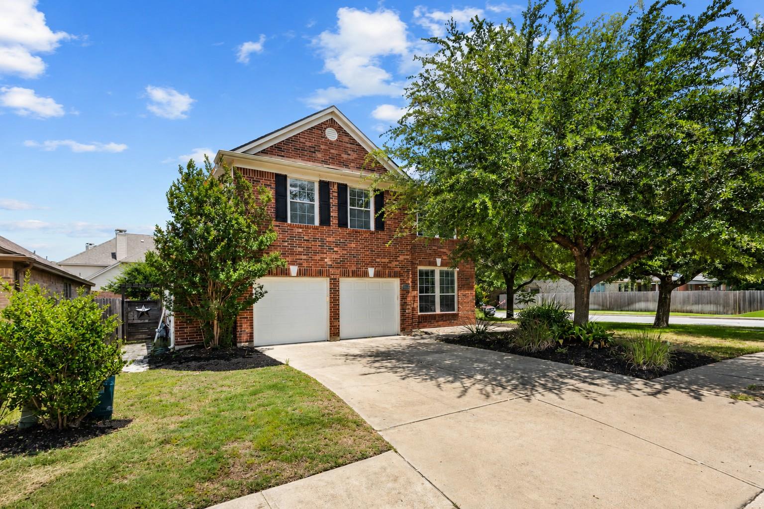 A classic brick exterior with a well-maintained l