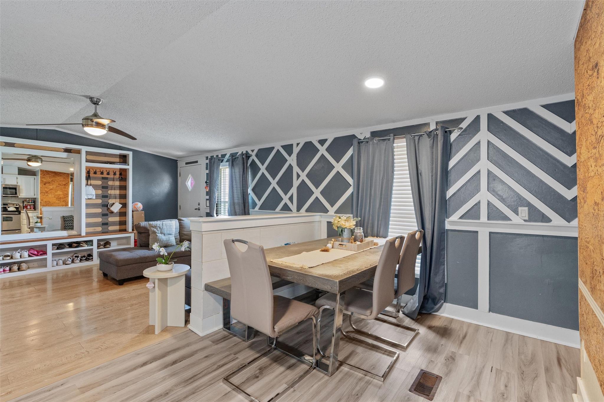 This combined dining and living area features div