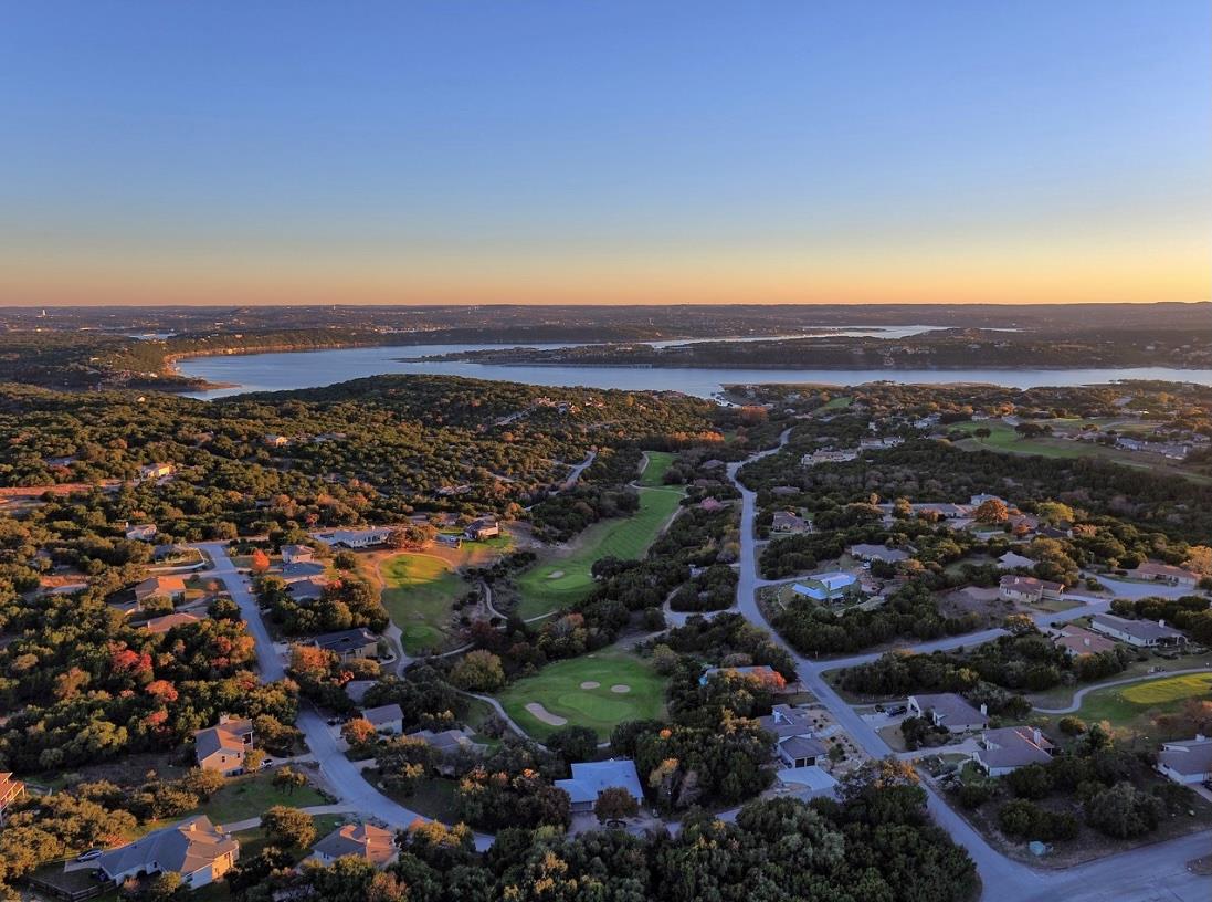 Overlook a golf course community with a lake and 