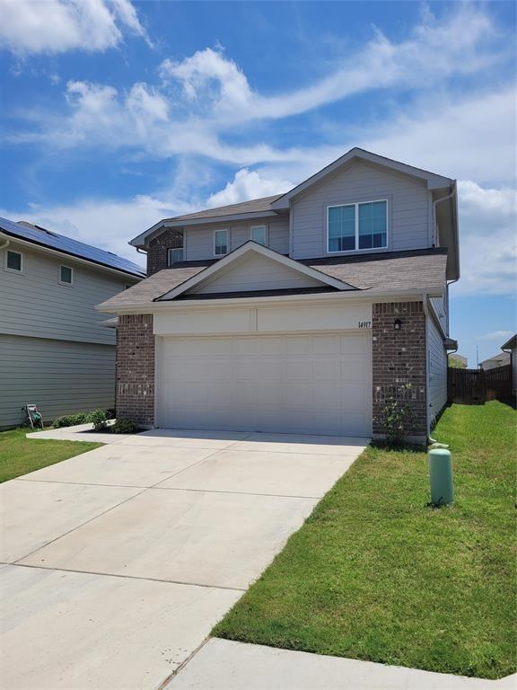 A well-maintained facade with a two-car garage of