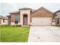 A classic brick and stone facade welcomes you to 