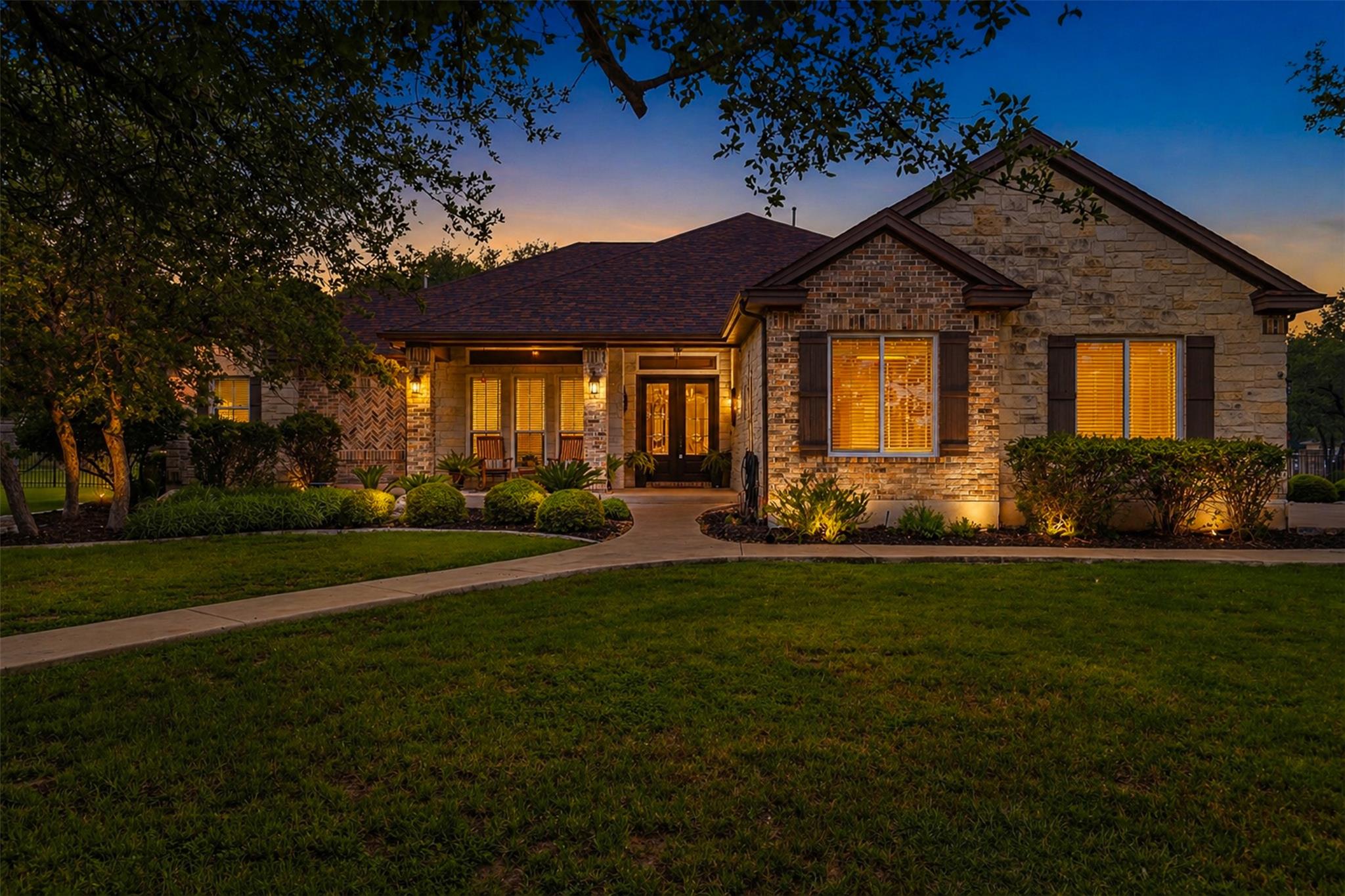 An inviting stone and brick facade with warm ligh
