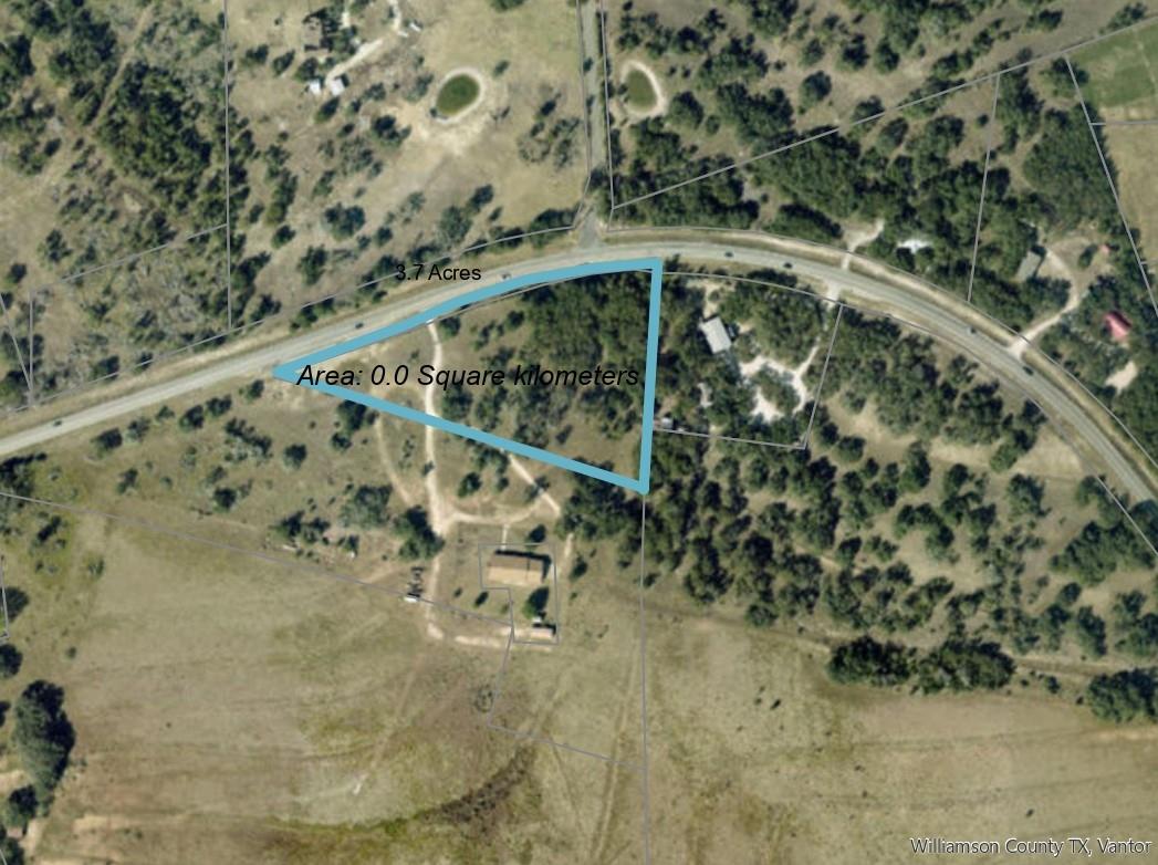 An aerial view showcases a generously sized plot,