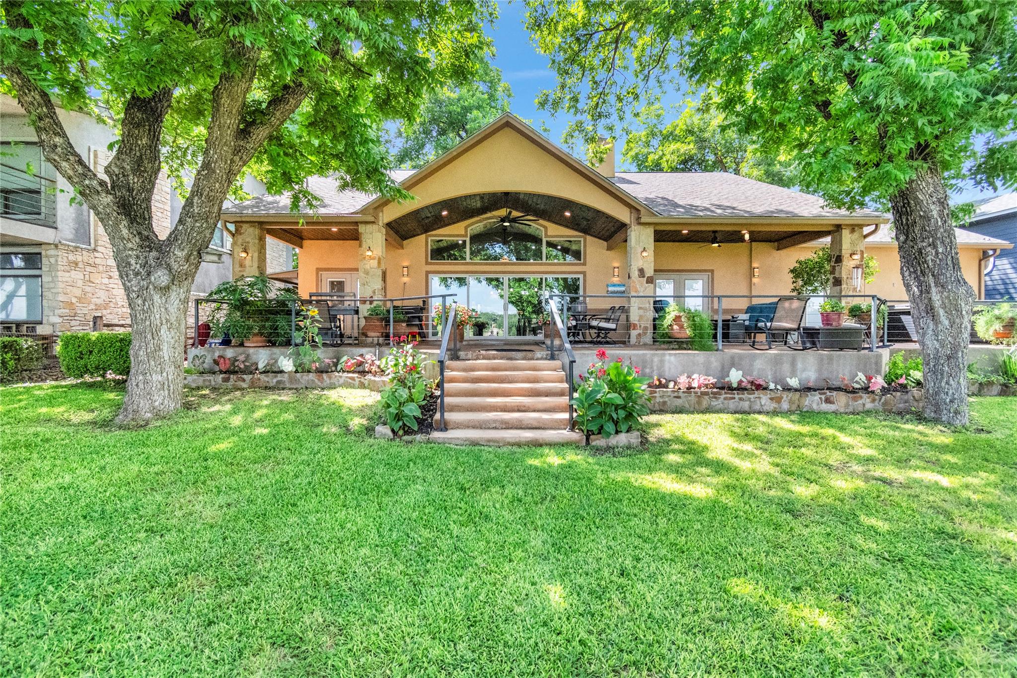 An inviting backyard oasis awaits with a spacious