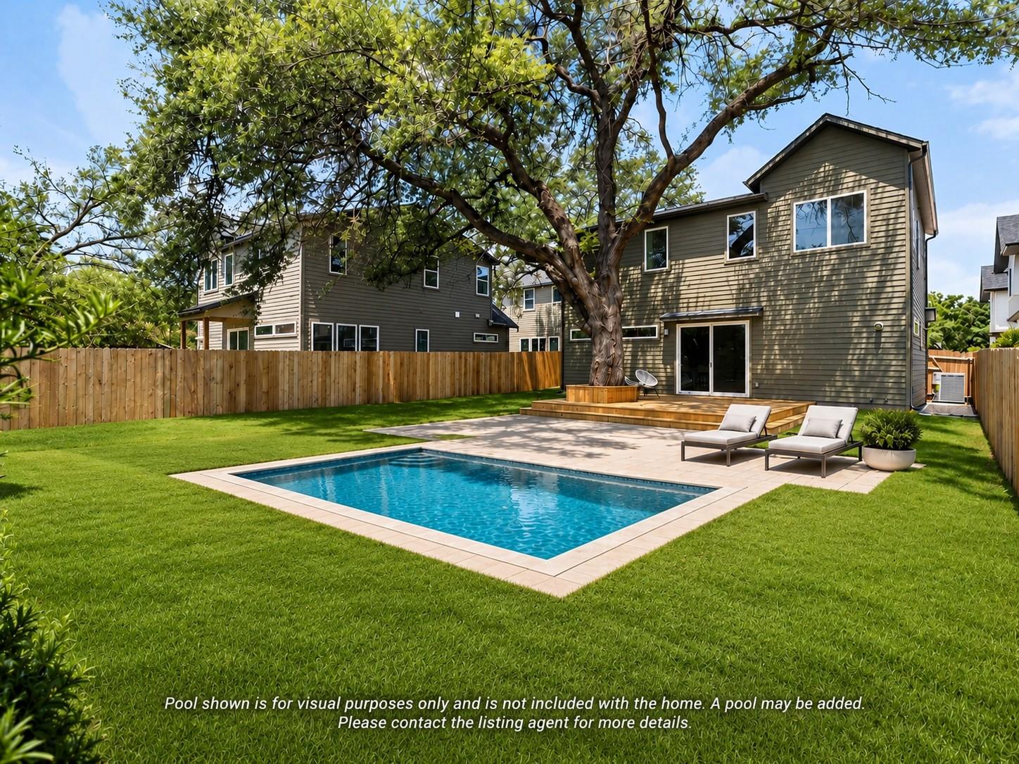 Mature trees shade a spacious green lawn complete