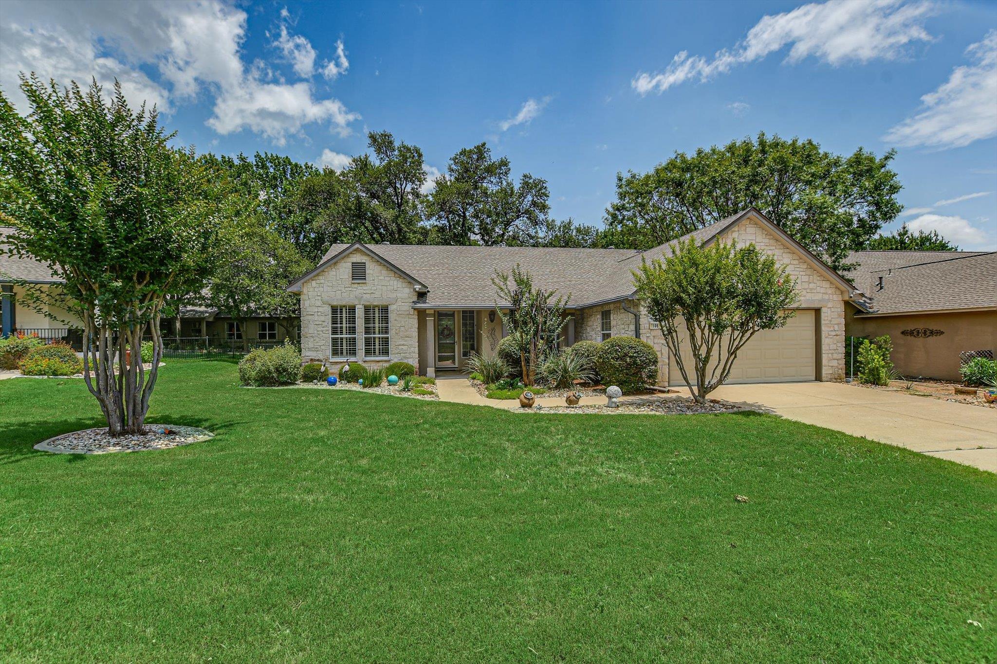 A classic stone facade home welcomes you with its