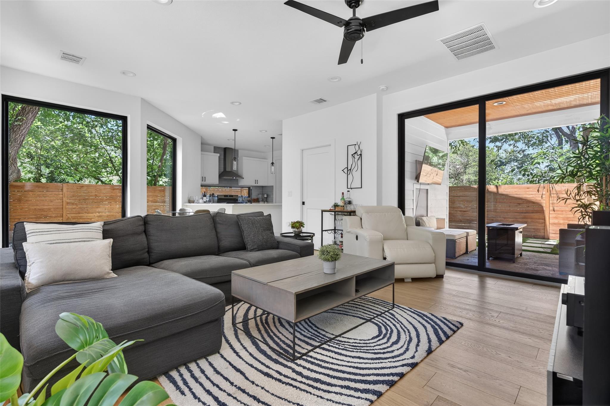 An open-concept living area flows seamlessly to t