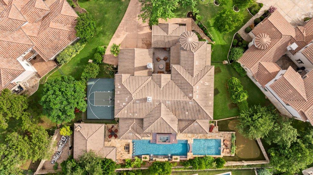 An aerial perspective reveals a private estate wi