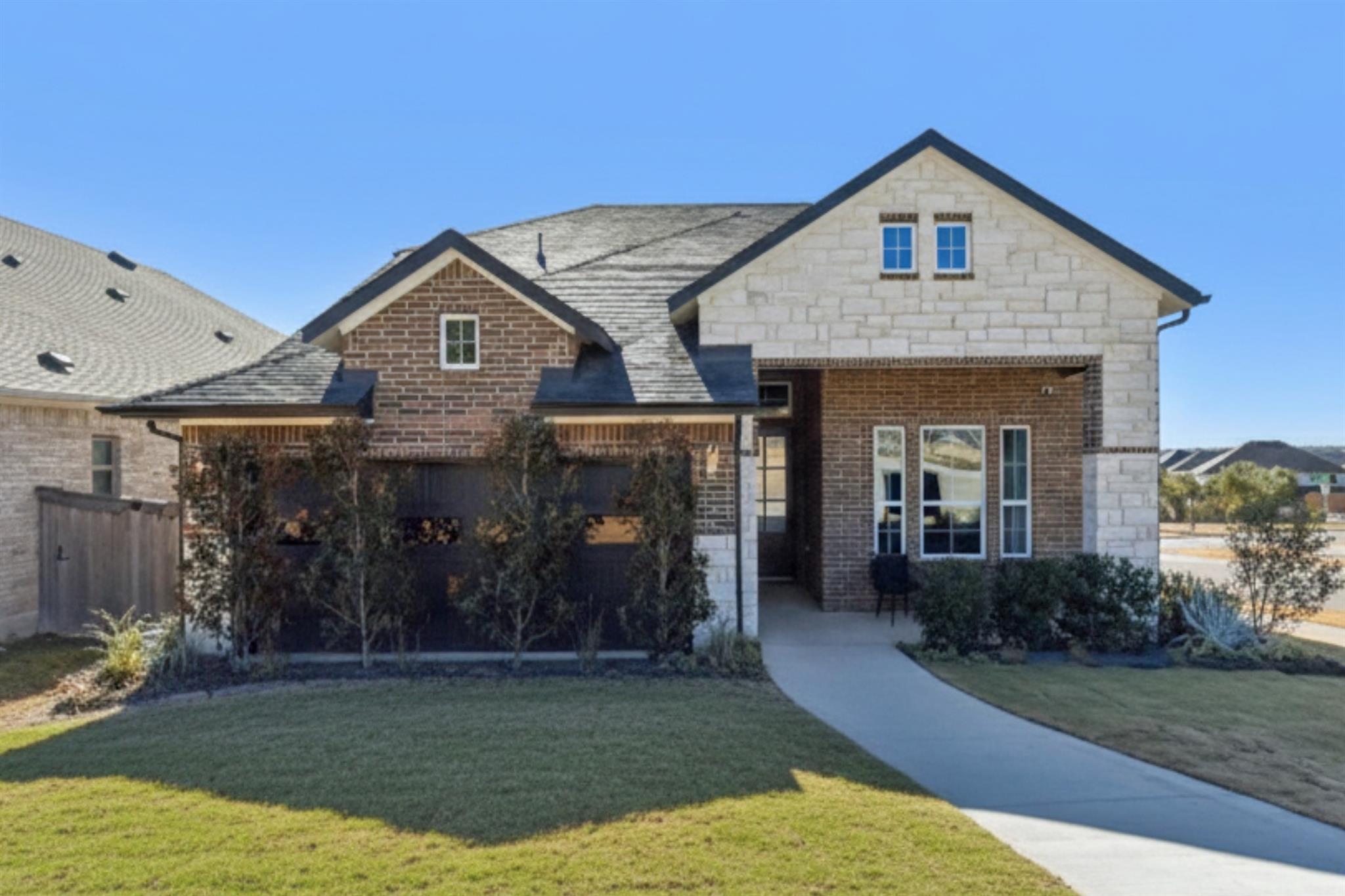 A classic brick and stone facade welcomes you to 