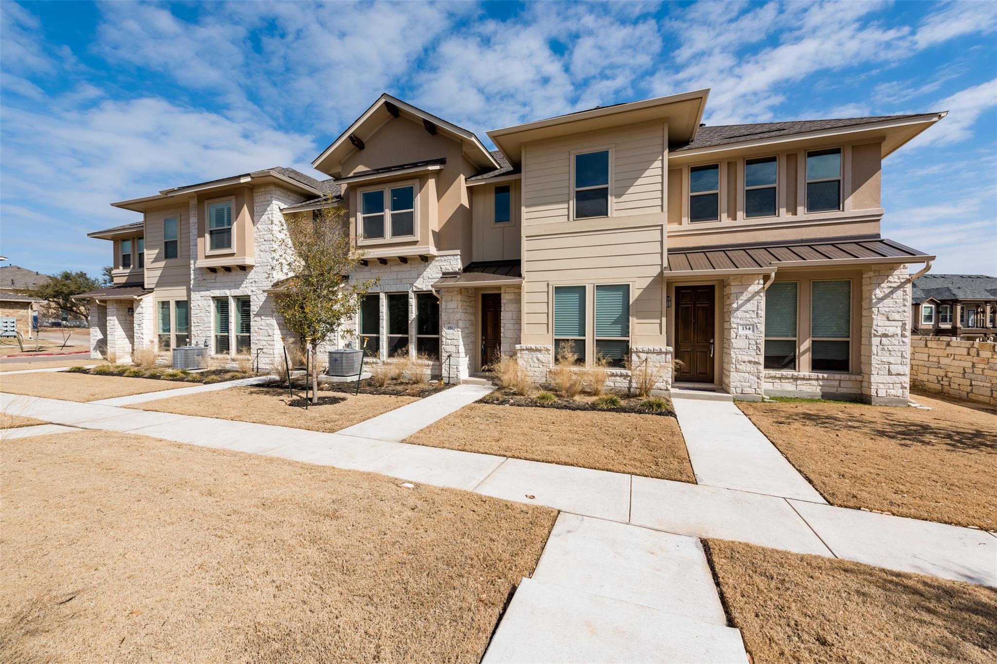 Showcasing a charming facade with stone accents, 