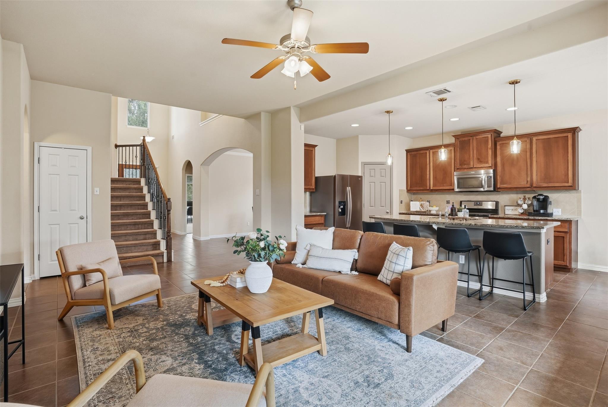 An open floorplan seamlessly connects the living 