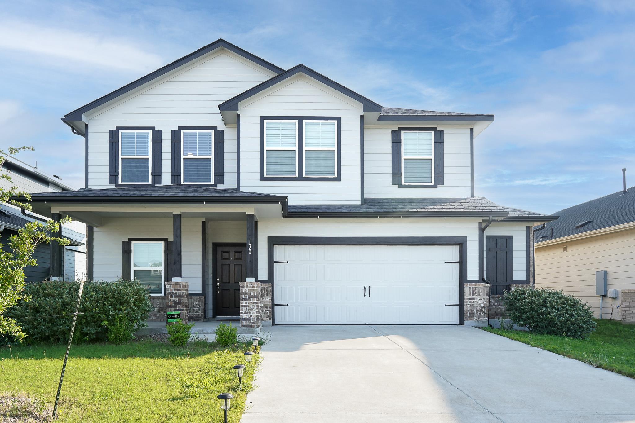 A welcoming front exterior showcasing crisp white