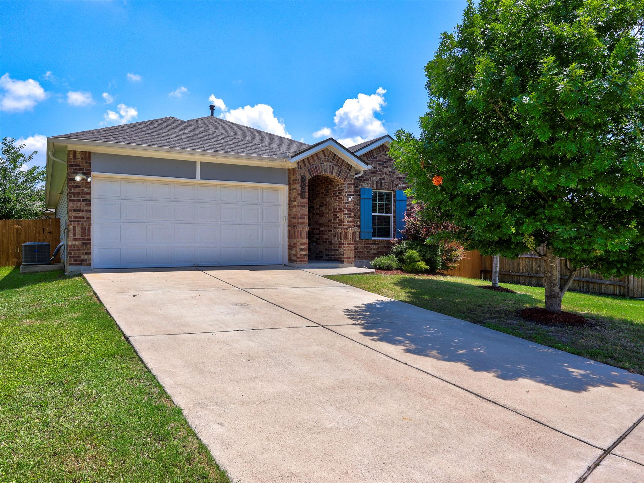 A classic brick exterior with inviting blue shutt