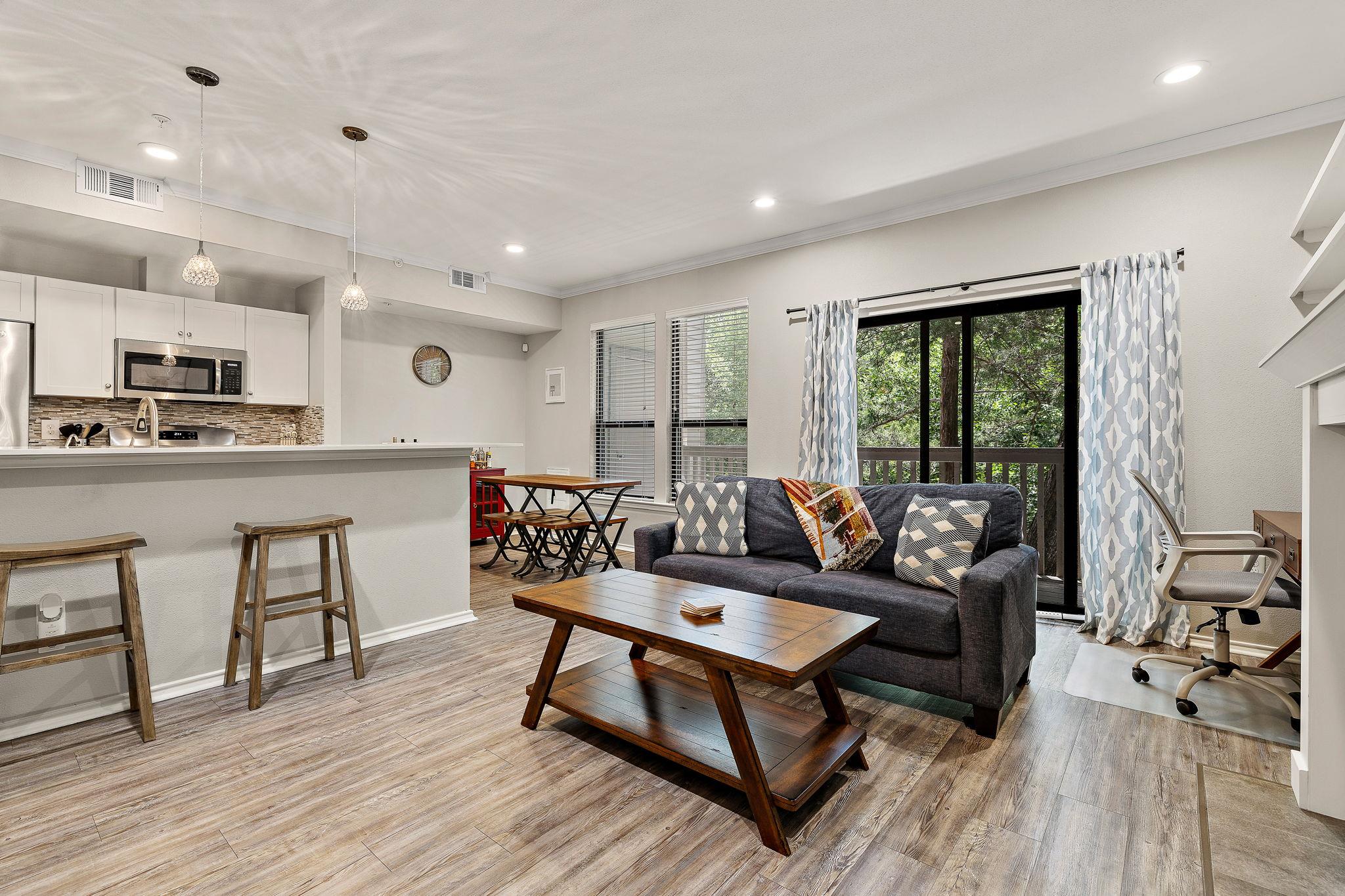 An inviting living space with sleek flooring and 
