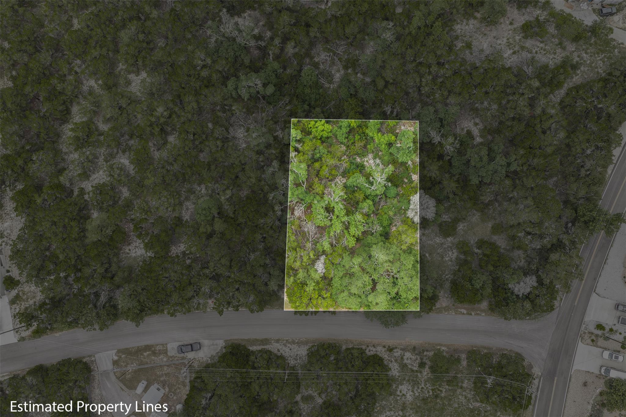 A verdant parcel of land, surrounded by nature, r
