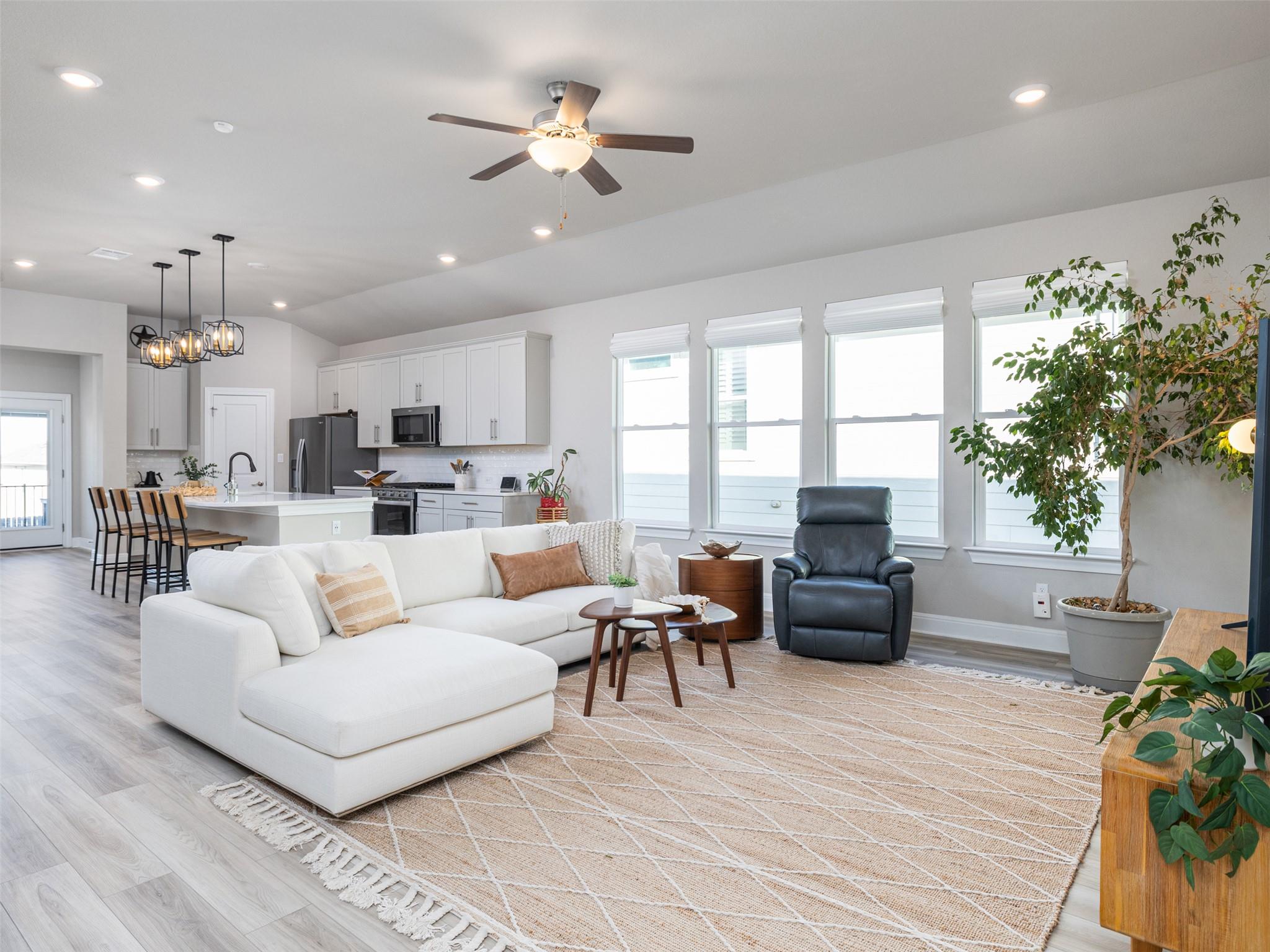 An inviting open-concept living area flows into a