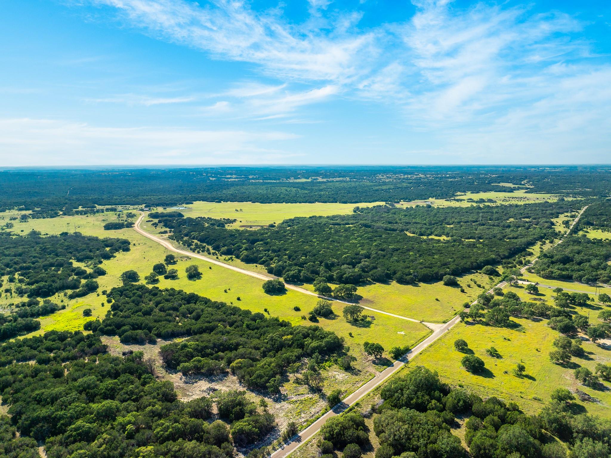 Panoramic views unfold across a vast expanse of l
