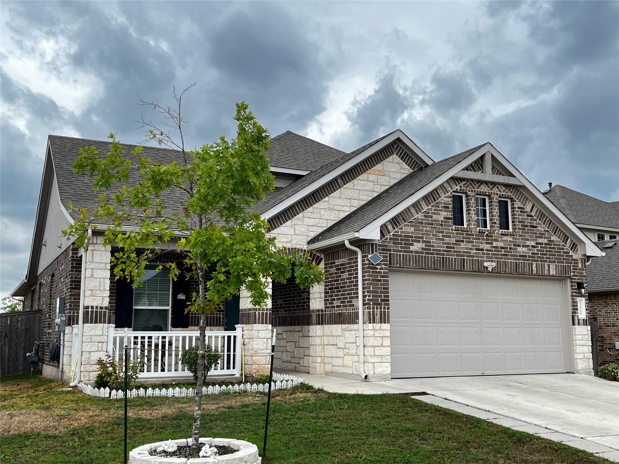 A classic brick and stone facade welcomes you to 