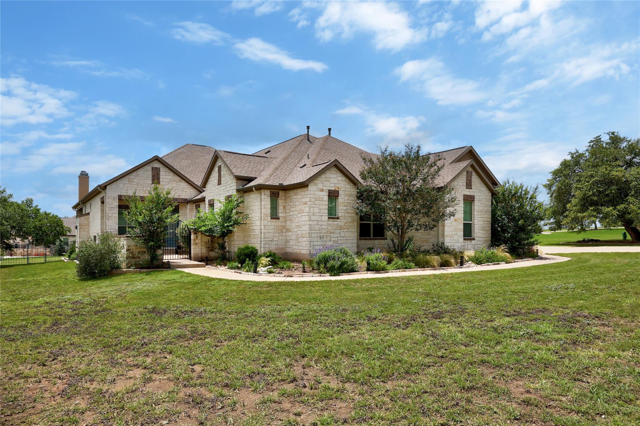 A classic stone facade with varied rooflines and 