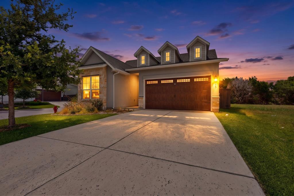 Dramatic sunset skies frame this modern elevation