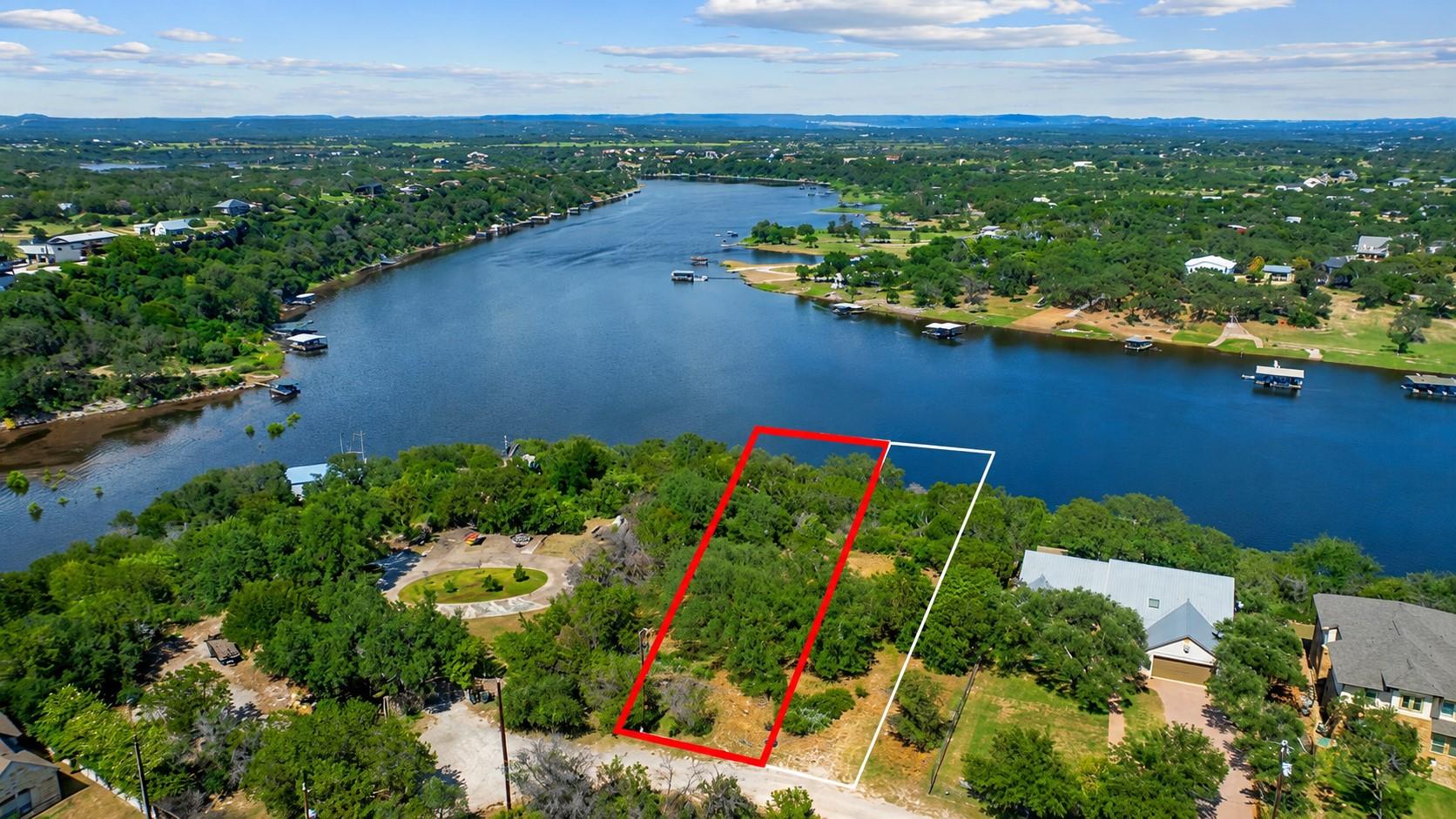 A tranquil lakefront lot awaits, offering unparal