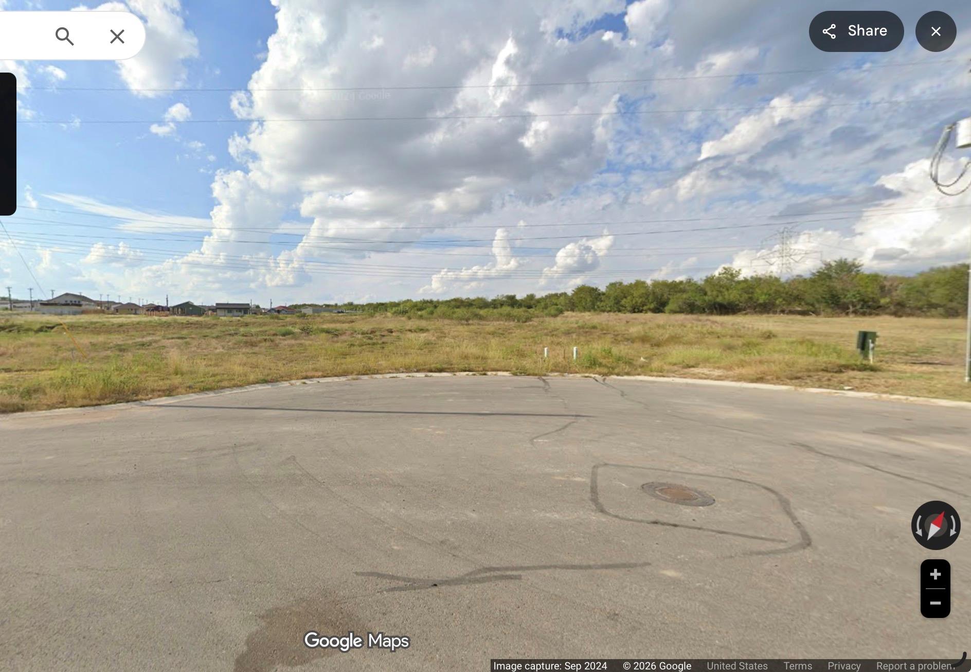 A spacious undeveloped lot with potential for a f